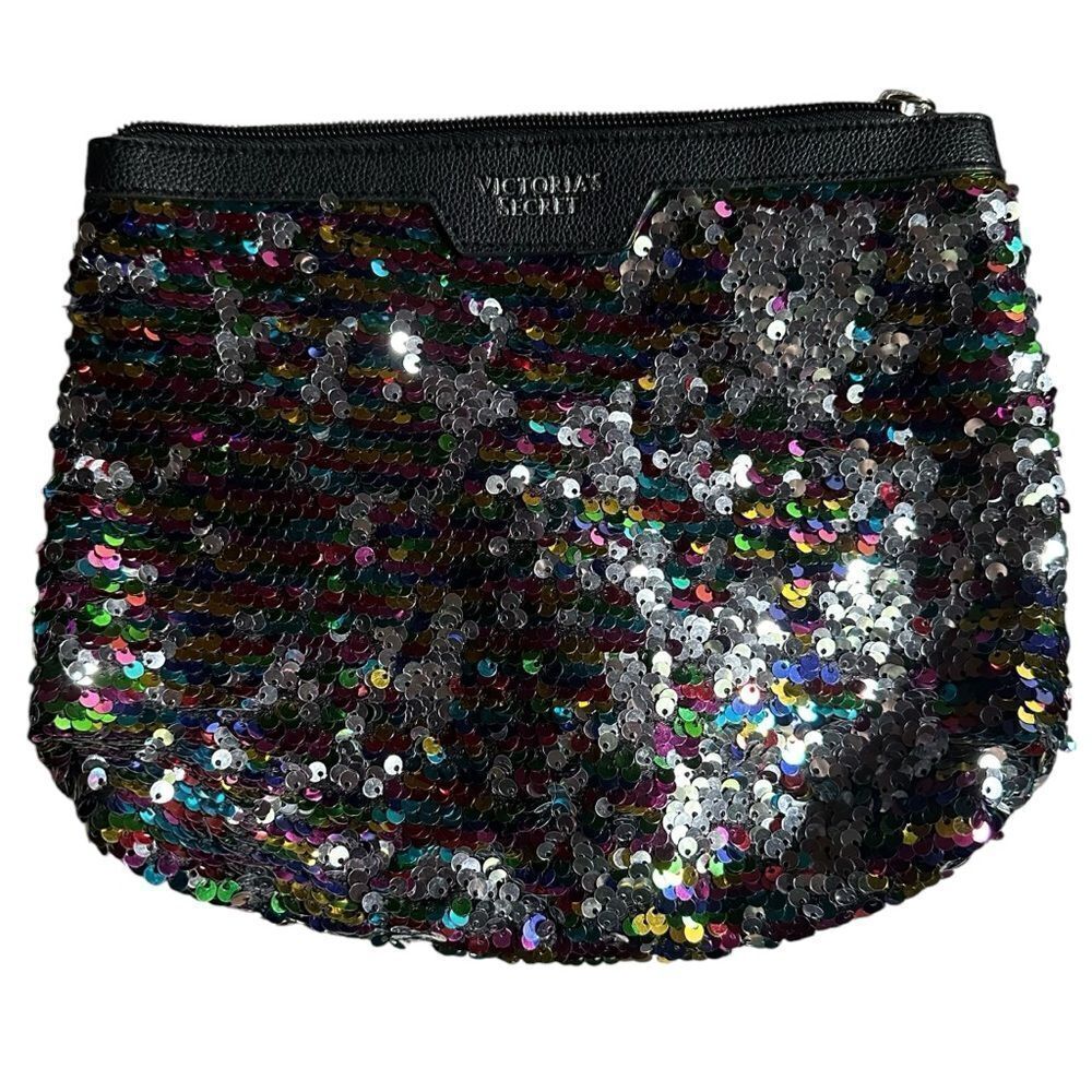 Victoria’s Secret Multicolored or Black Sequined Clutch Bag.